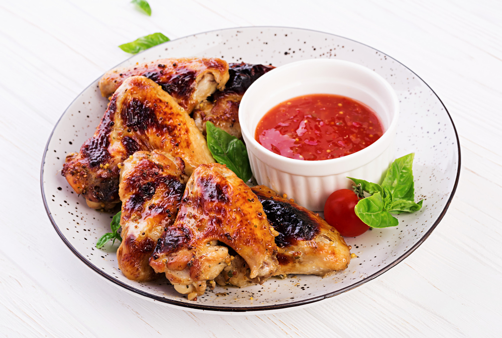 baked-chicken-wings-asian-style-tomatoes-sauce-plate