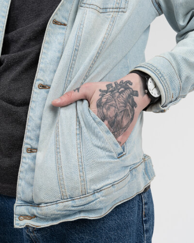 close up of tattooed hand in pocket 1 1 Fashion Trend