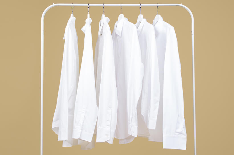 white shirts on the hangers on the rank 1 Fashion Baju Panjang